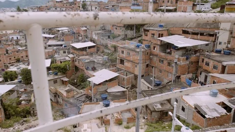 Slow motion pan of gritty favela in rio de janeiro Video stock 96131339