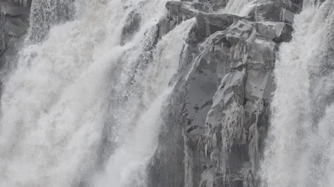 Slow Motion Pan of Icy Waterfall - 120p - Shallow DOF Stock Footage 145997929