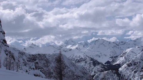 Slow motion pan over high alpine mountains Video stock 120057853