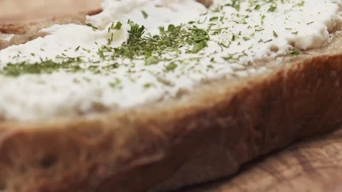 Slow motion pan reveal sandwich with herbs Stock Footage