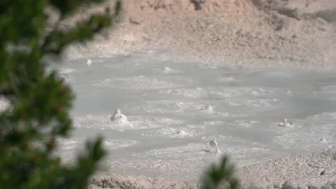 Slow motion pan right across geothermal hot springs at Yellowstone Stock Footage 229847284