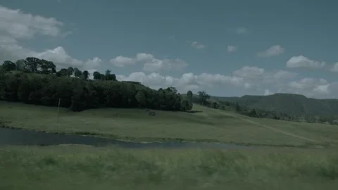 Slow Motion Pan of Rolling Green Hills and Trees, Sunshine Coast Hinterland, Aus Stock Footage 341298149