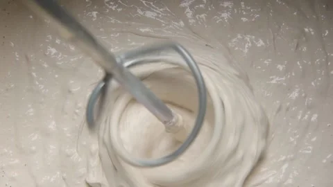 Slow motion pan shot of mixing concrete plaster Video stock 135104974