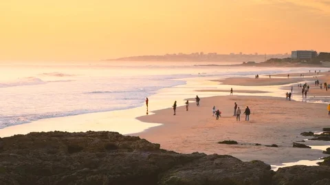 Slow motion panning from atlantic ocean to the coast of Carcavelos beach, Stock Footage 108925523