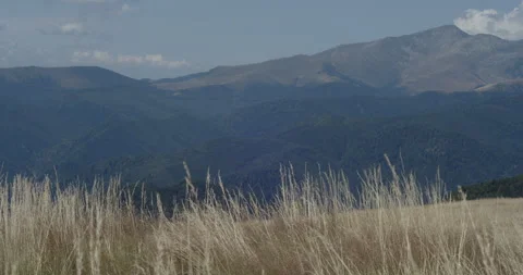 Slow motion panning on Parangul Mare peak in Romania 4k video 動画素材 267497174