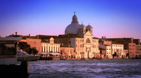 Slow motion, panning shot of the Bauer Palladio Hotel from across the waterway Stock Footage 52301811