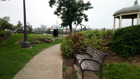 Slow Motion Panning Video Of bench in the park Stock Footage 138641193