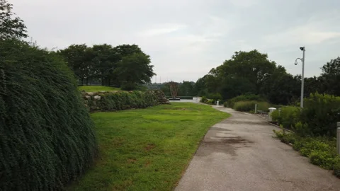 Slow Motion Panning Video Of path in the park Stock Footage 138643648