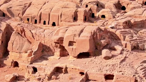 Slow motion panning view cave houses in Petra site with theater monument 스톡 동영상 226840957