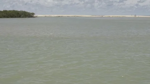 Slow Motion Panoramic of Gramame River Meeting Ocean, Barra do Gramame Stock Footage 320571947