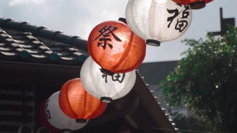 Slow Motion: Paper Lanterns Blowing In The Wind at Little Tokyo, Los Angeles Stock Footage 90971216