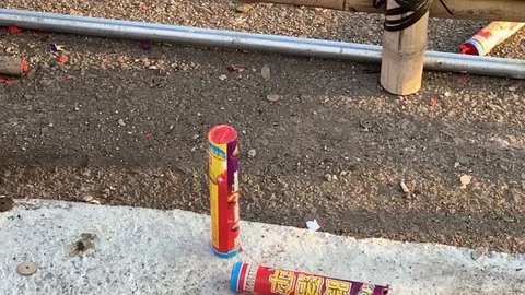 Slow motion of parachute firework being set off Stock Footage 102611293