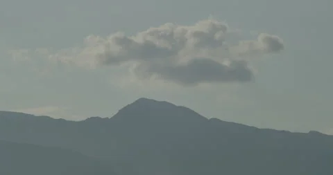 Slow motion Parangul mountain peak under the cloud 4K video 動画素材 253232285