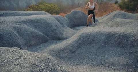 SLOW MOTION, Partners of Trail Running in the rock mountain climb up Stock Footage 124506130