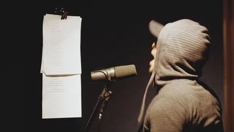 Slow Motion of a Passionate Singer recording vocals in a professional studio Stock Footage 93172557