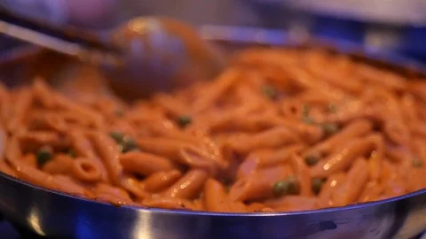 Slow motion pasta being stirred in bowl Stock Footage 112767816