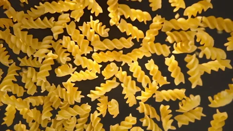 Slow motion of pasta on a black background Stock Footage 148163806