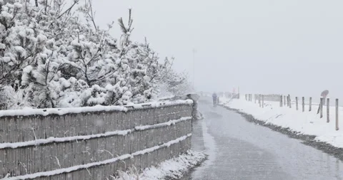 Slow motion path along the coast after snowfall in Japan Video stock 348211762