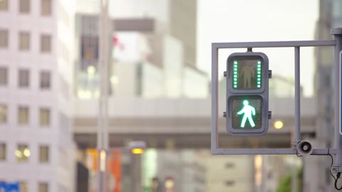Slow motion of pedestrian signals on brick wall changing from red to green Stock Footage 321144384
