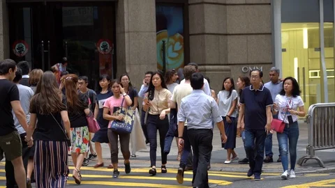 Slow motion of Pedestrians walking over the street in Hong Kong 動画素材 124988377