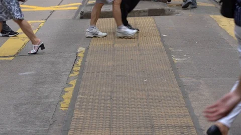 Slow motion of Pedestrians walking over the street in Hong Kong 動画素材 124988445