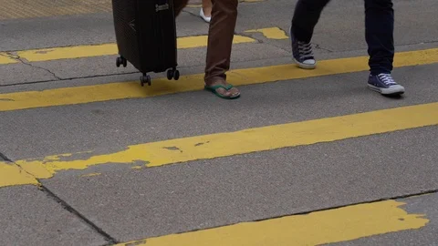 Slow motion of Pedestrians walking over the street in Hong Kong Stock Footage 124988501