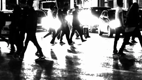 Slow motion of pedestrians while crossing the street at night Stock Footage 120423944