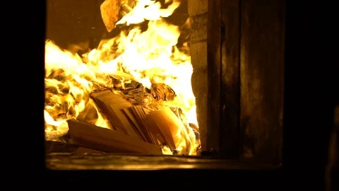 Slow Motion of people burning ghost money in honor of the ancestors spirit-Dan Stock Footage 102772273