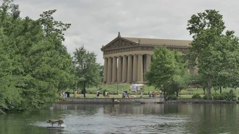 Slow Motion People Enjoy Springtime at the Parthenon in Nashville Stock Footage 76381724