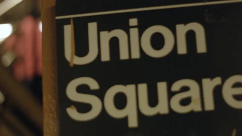 Slow motion of people going up stairs as they exit at Union Square in NY Stock Footage 85581553