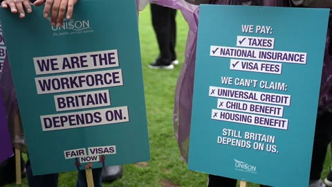In Slow Motion People Hold Placards That Read “We Are The Workforce Britain Stock Footage 338053078