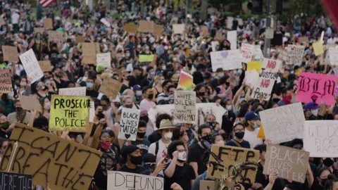 Slow motion of people marching on a protest, BLM, Hollywood, LA, June 2020 Stock Footage 135339701