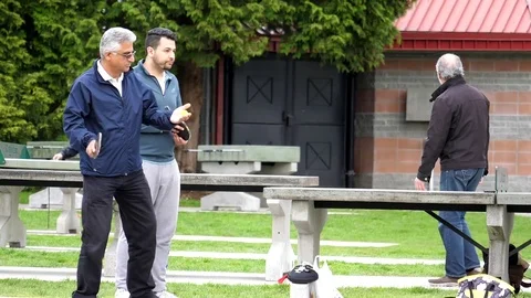 Slow motion of people playing table tennis at park in Coquitlam BC Canada Video stock 75802701