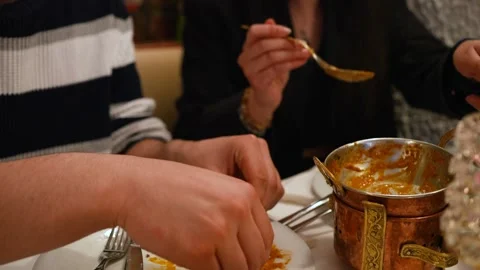 Slow motion of people preparing their plate Stock Footage 200863735