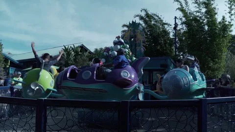 Slow motion of people on roller coaster ride at fun theme park, California Stock Footage 122378765