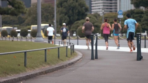 Slow-motion - People running on the streets of the city Stock Footage 88987457