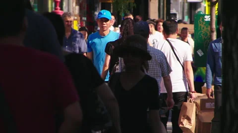 Slow Motion  - people on Sidewalk.  compression   Flushing, Queens   4K Stock Footage 141883494