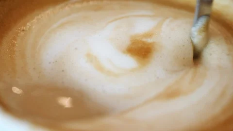 Slow motion, people using spoon swing mixing hot coffee drink Stock Footage 90379820