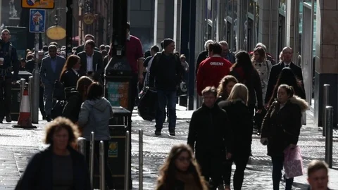 Slow motion of people walking on Buchanan Street in Glasgow Stock Footage 98973616