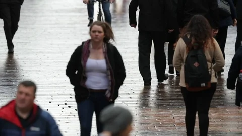 Slow motion of people walking on Buchanan Street in Glasgow Stock Footage 98973853