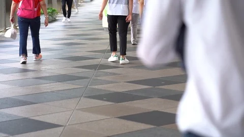 Slow Motion of people walking suspended footbridge Stock Footage 124988873