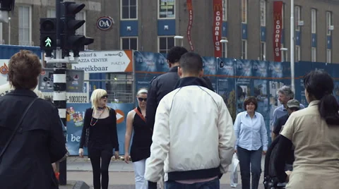 Slow motion people walking traffic lights Stock Footage 57324034