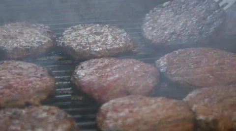SLOW MOTION: Perfect burger flip caught on a camera Stock Footage 53344145