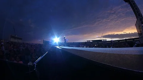 Slow-motion of performer running back to stage Video stock 118724450