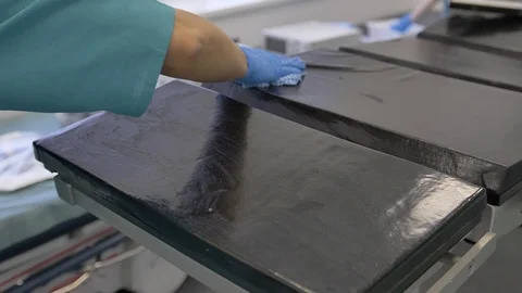 Slow Motion with a person's hands Wearing Protection Gloves, Cleaning and Stock Footage 126304423