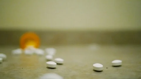 Slow Motion Pill Bottle Drop Pills Spilling Vídeo Stock 106474840
