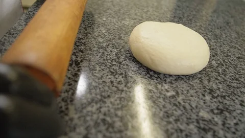 Slow motion pizzayola in restaurant making pizza Stock Footage 121889623
