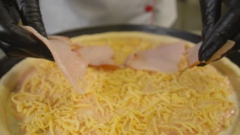 Slow motion pizzayola in restaurant making pizza Stock Footage 121890331