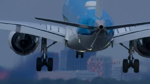 Slow motion plane approaching runway Stock Footage 283027524