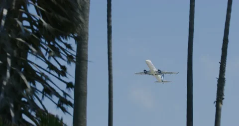 Slow motion of planes mid air from Dockweiler Beach in Los Angeles, California Stock Footage 115087059